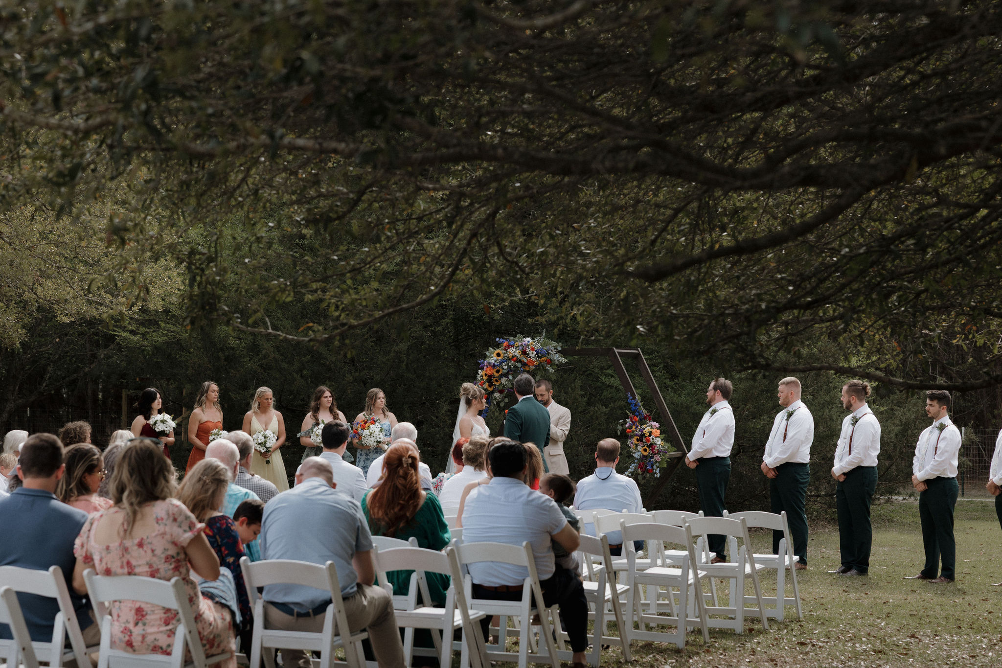 A gorgeous shaded and backlit wedding ceremony at a private residence in Loris, South Carolina.